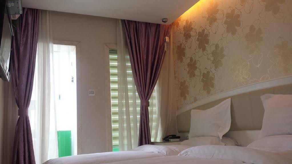 Xinghe Boutique Hotel Guangzhou Bus Station Branch Екстер'єр фото